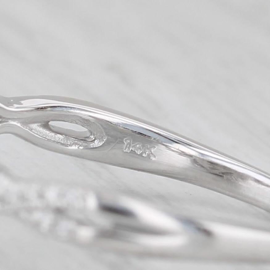 Anello di fidanzamento aureolato con diamante rotondo da 0,57 carati in oro bianco 14k, misura 10 in vendita 4