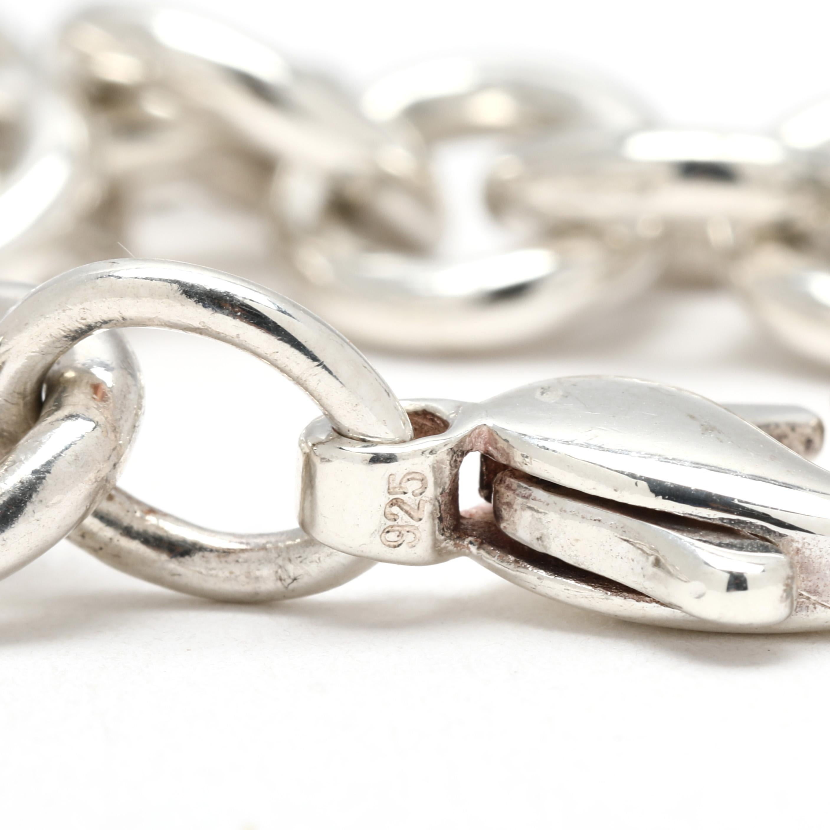 Bracciale Charm Tiffany & Co. con cuore, A. Silver, lunghezza 6,75 pollici In condizioni buone in vendita a McLeansville, NC