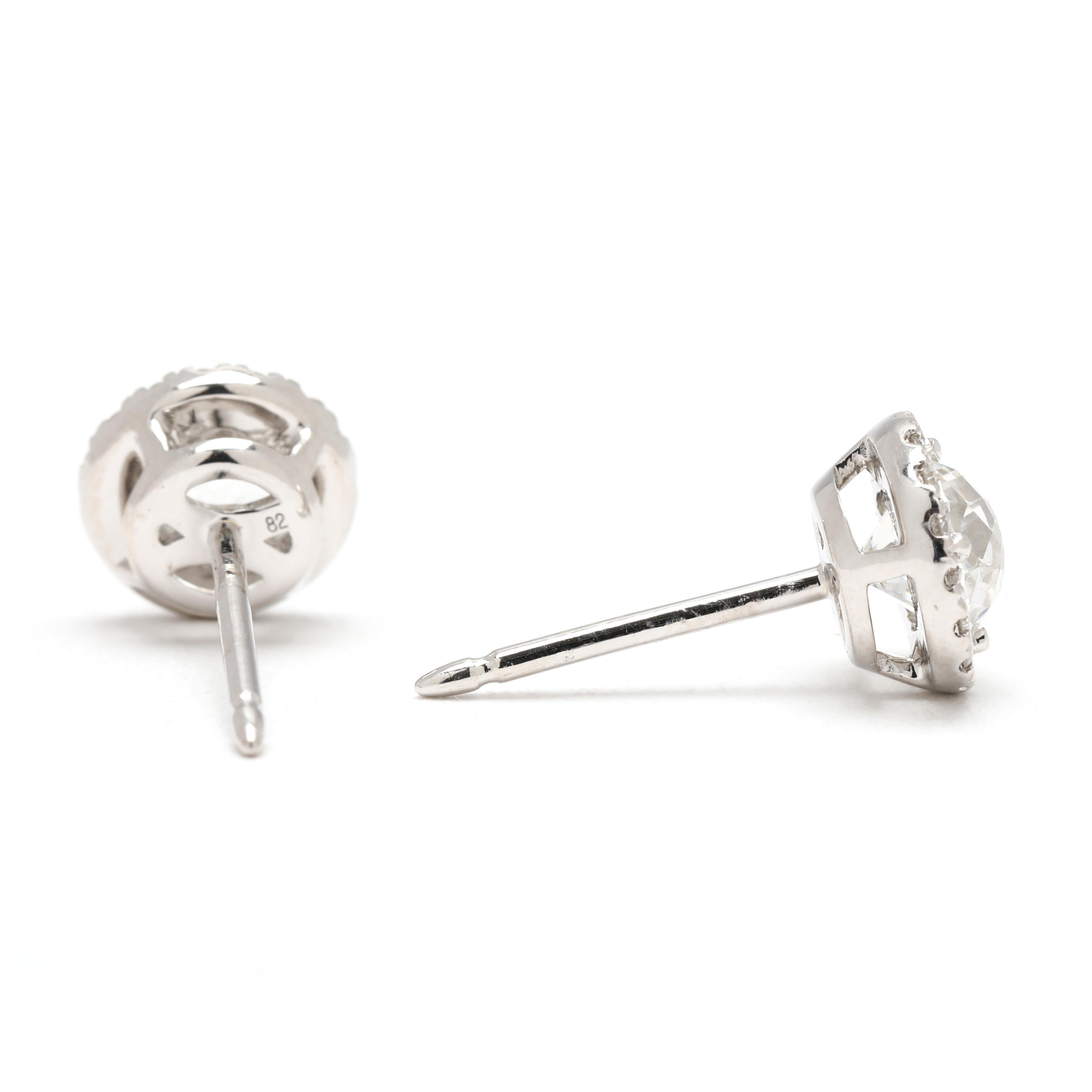 Pierres :
diamant
couronne de lumière, 2
environ 1,16 carats au total
Couleur EF/ Clarté VS1-2 (rapport AGS pour 1 pierre)
taille ronde brillante, 32
1.1 mm
environ .16 carats au total
Couleur FG/ Clarté VS1-2

Longueur : 7,4 mm

Poids : 1,7 dwts /