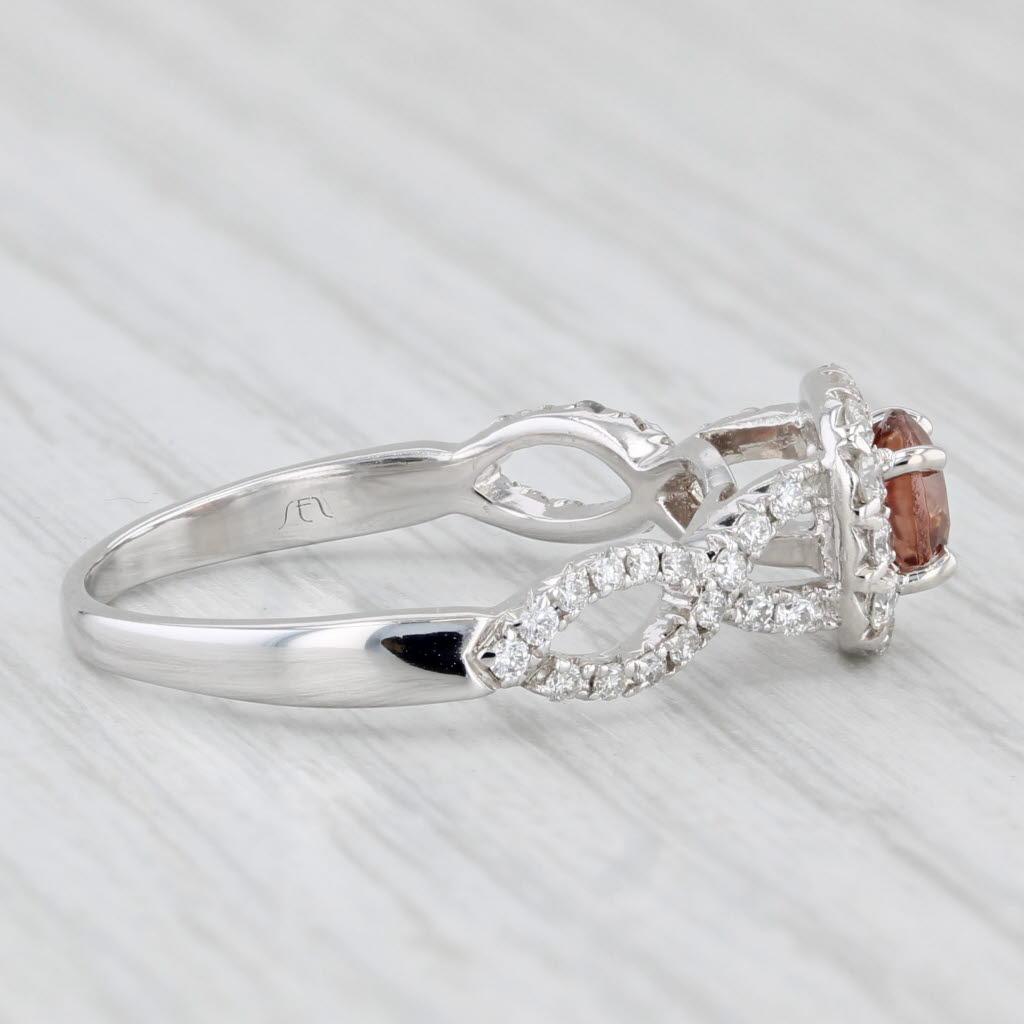 Informazioni sulla gemma:
- Diamante Nature -
Carati - 0,70ct 
Taglio - Brillante rotondo
Colore - Marrone chiaro
Si noti che la superficie dello zircone è un po' usurata.

- Diamanti naturali -
Carati totali - 1,08ctw
Taglio - Brillante
