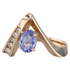 Anillo en forma de «V» con diamantes y tanzanita (0,75 ct en total), de oro amarillo de 14k, talla 6,5
