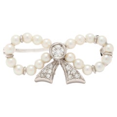 0.15ctw Diamond & Pearl Bow Brooch, 14k White Gold, Length 1 in