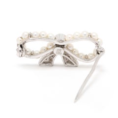 0.15ctw Diamond & Pearl Bow Brooch, 14k White Gold, Length 1 in