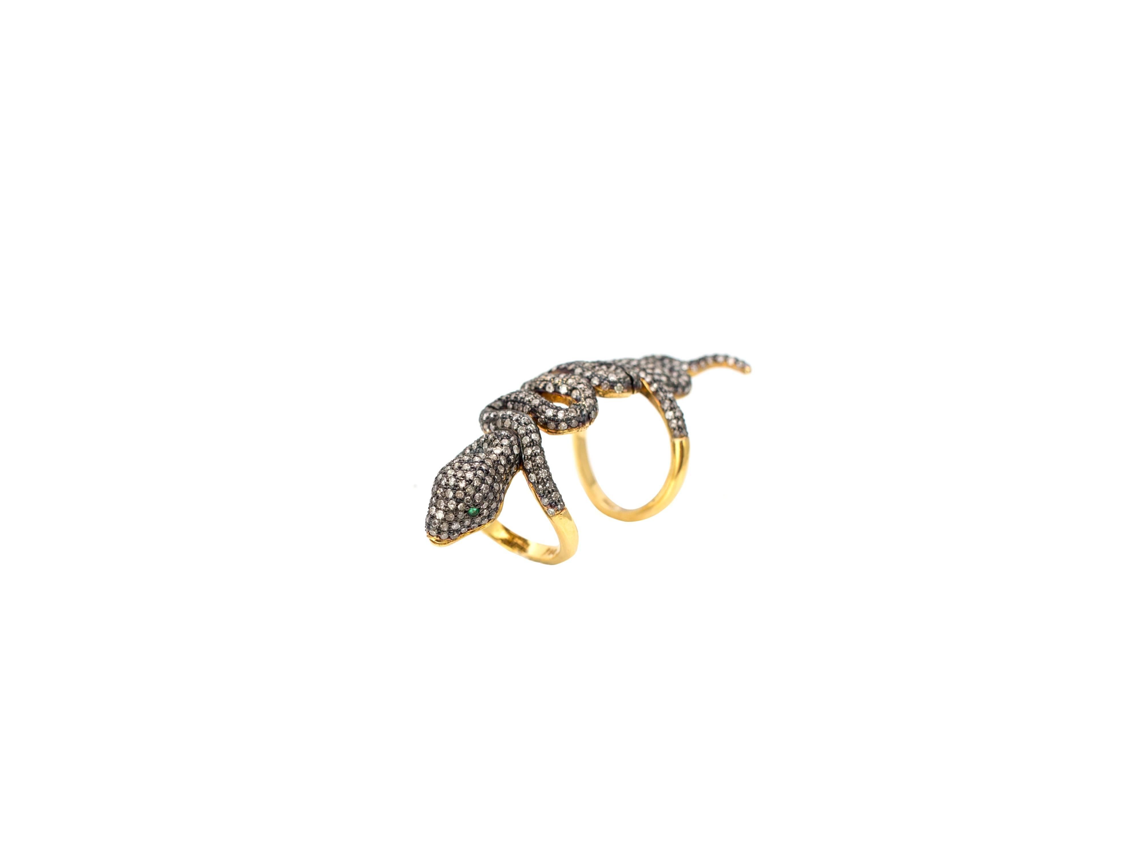 Over the knuckle snake ring by designer Samira13 features 4.5 carats of champagne diamonds set in vermeil silver. Ring size 7.