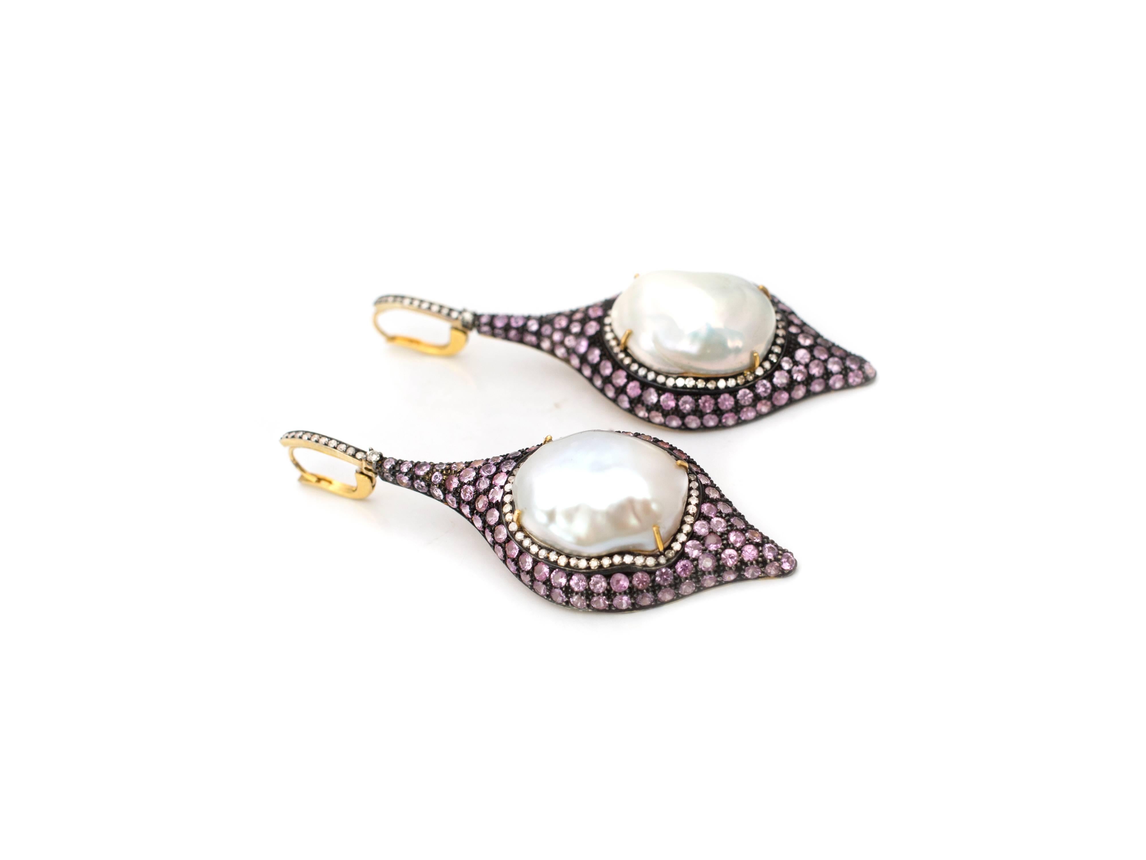 Baroque Tahitian pearl earrings by designer Samira13 featuring 1.64 carats of champagne diamonds and 10.8 carats of pink sapphire set in vermeil silver with lever back closures.