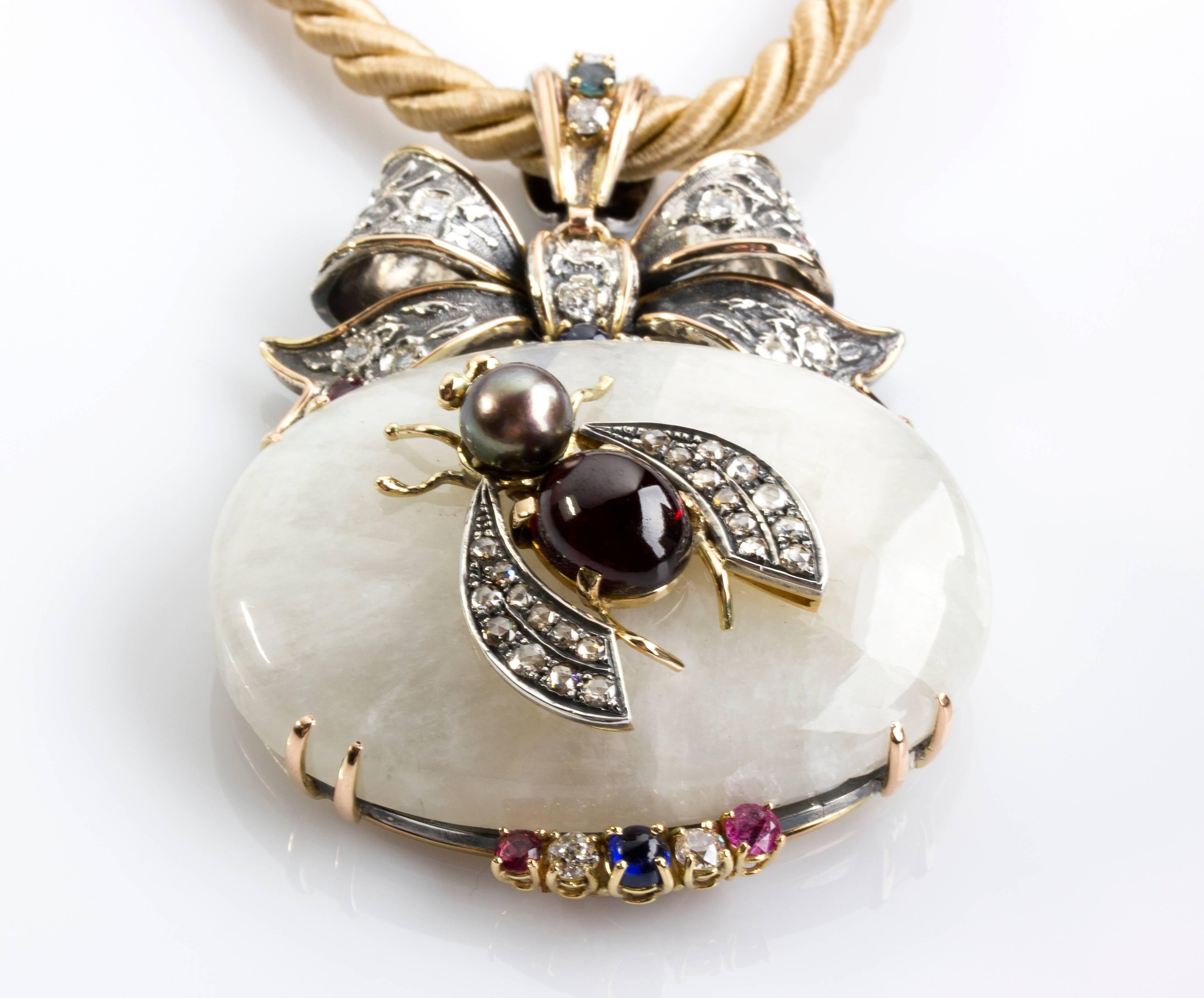 Pendant decorated with old-cut diamonds weighing 2.2 ct, rubies weighing 0.80 ct and sapphires weighing 0.55 ct. Quartz set with a fly, above there is a bow. Length total 295 mm (11 39/64 in), pendant length 80 mm (3 5/32 in), pendant width 55 mm (2