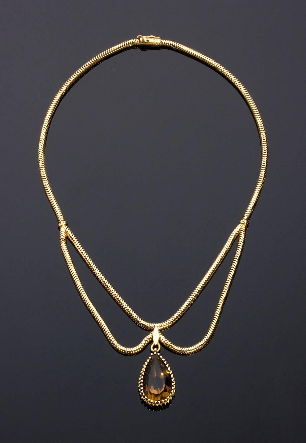 Classic 1950’s Italian gold and smoky quartz necklace. Safety claps. Italian assay mark 750 + 4 VR,  goldsmith Castellarin Bruno. 
Length 215 mm (8 15⁄32 in). Weight 44.80. 
Item condition grading: **** good - Ce.S.Ar. Certificate.