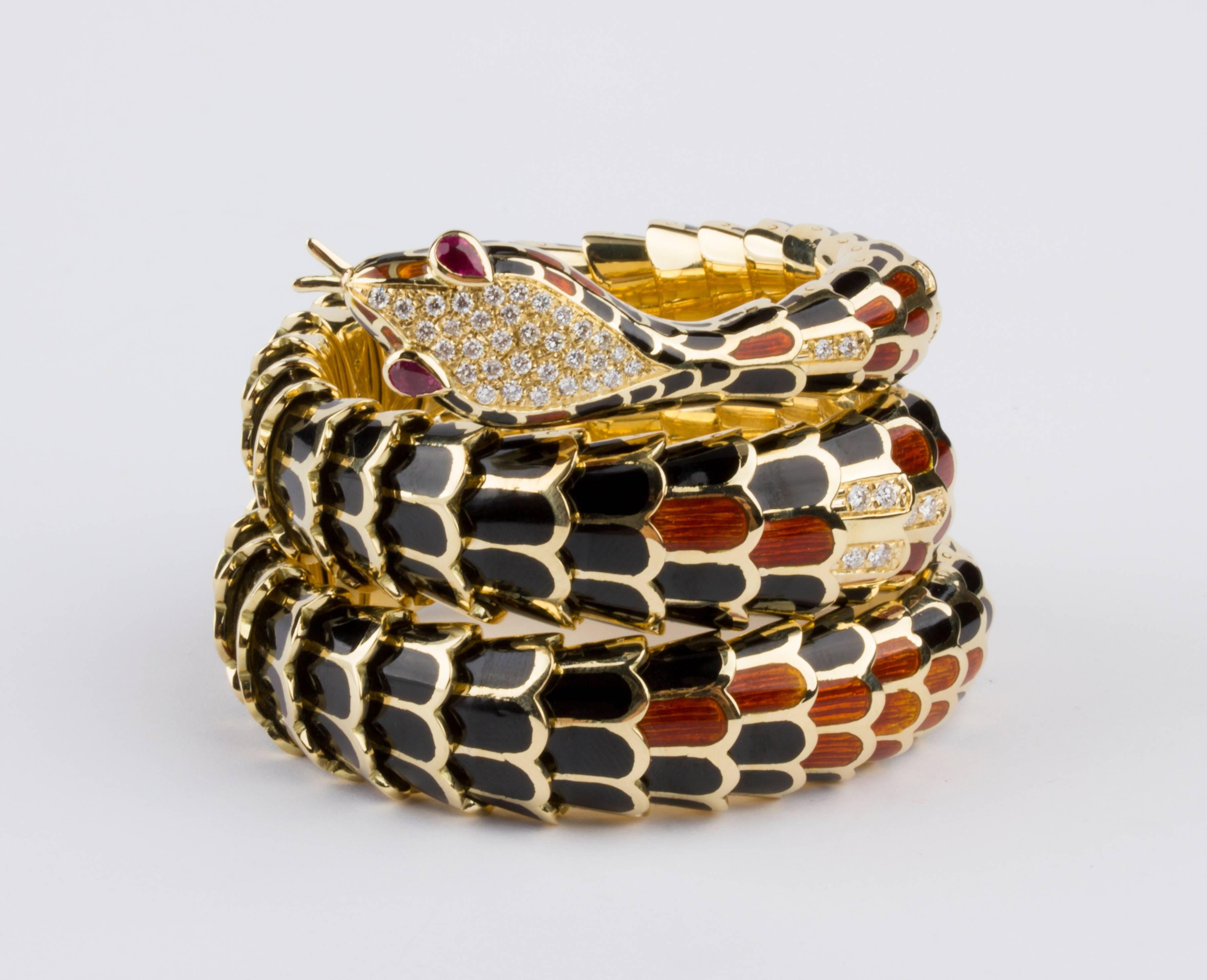 Realized in gold, shaped as a snake. The body is embellished with black and caramel colored enamels, the head and some parts of the body are covered with brilliant-cut pave diamonds, G color, VVS-VS clarity weighing 1.50 ct total. The eyes are set
