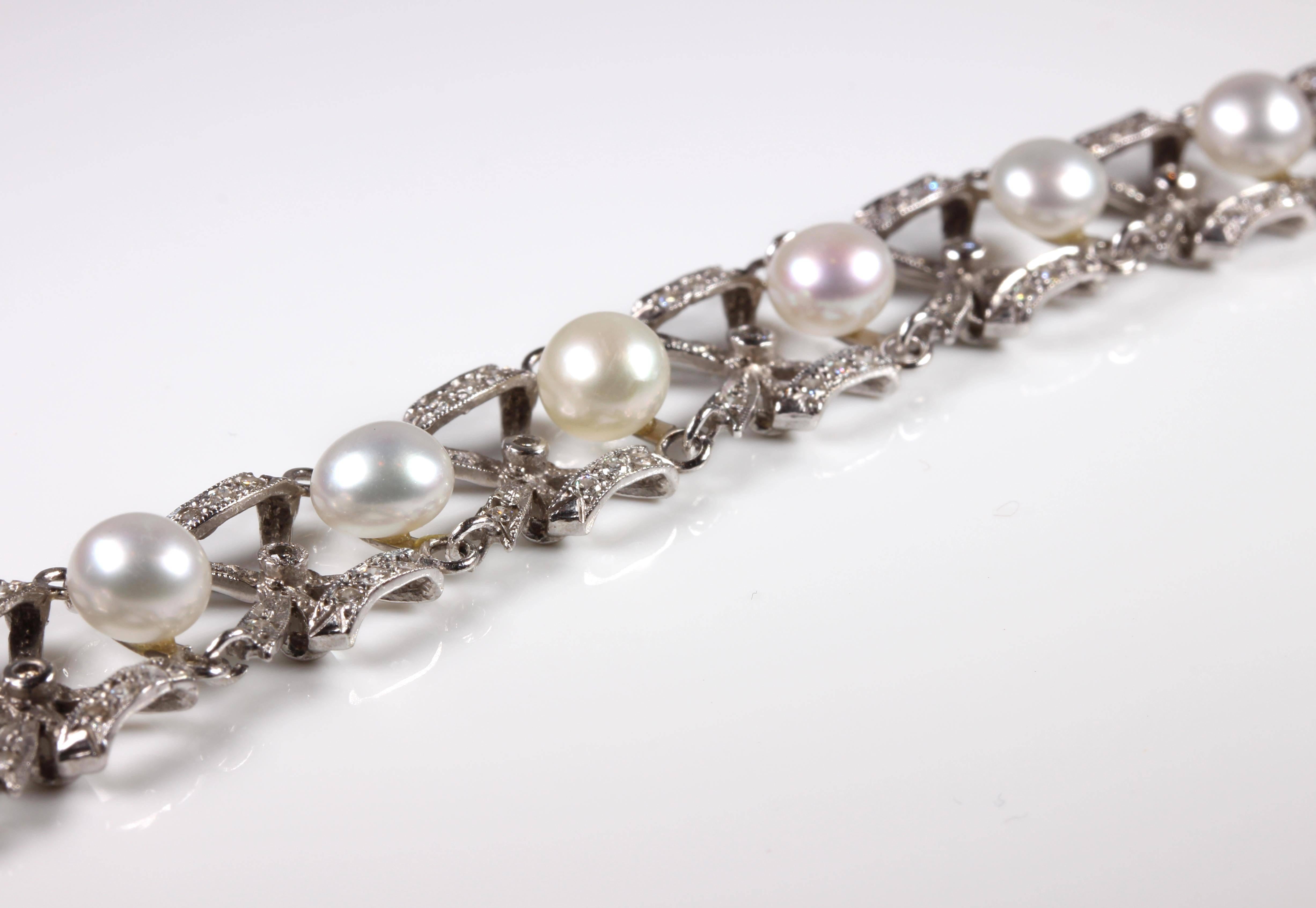 So pretty and stylish - this pearl and diamond bracelet is in 18ct white gold with 10 round cultured pearls showing colours of white, pink and silver measuring 5.90mm-6.60mm and 108 round brilliant cut diamonds colour G-J clarity SI1-I1 total