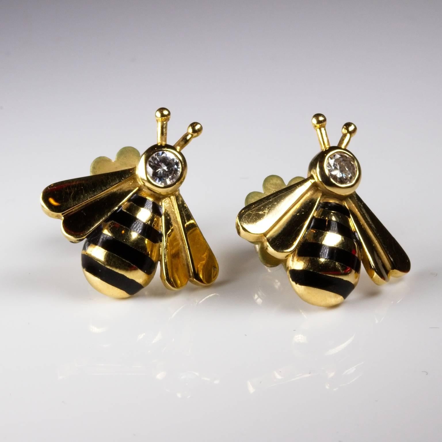 Smart and novel, these diamond stud earrings in the form of bees are set in 18ct gold with black enamel stripes. 9ct gold butterflies. 20mm wide and 17mm long. Previously owned by a European diplomat posted to Sydney, Australia.