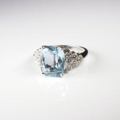 White Gold Blue Topaz and Diamond Dress Ring