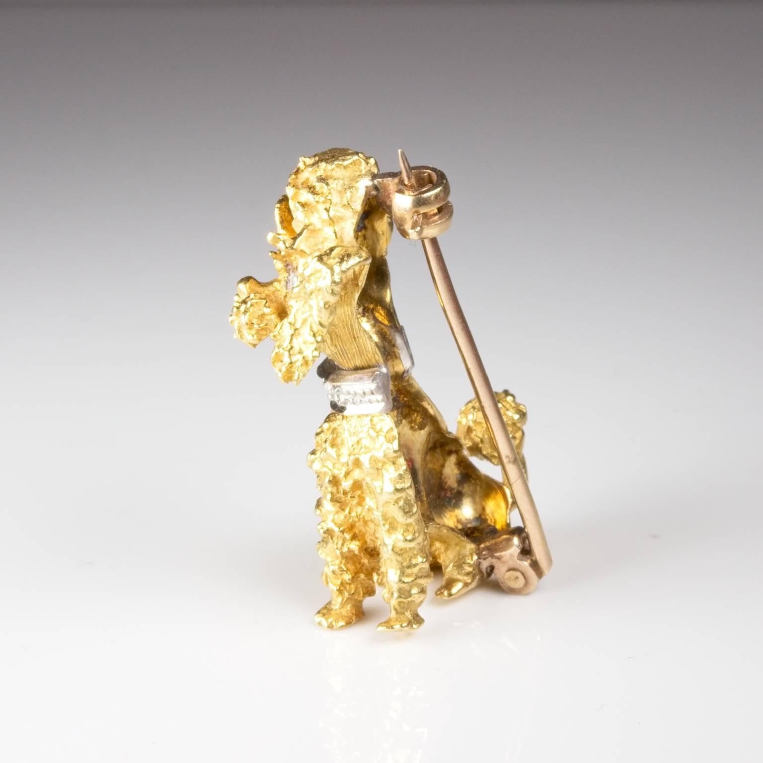 Cute doggie brooch in the form of a poodle with diamond eyes and collar. 18ct Gold. This item is unique and once sold cannot be replaced. 