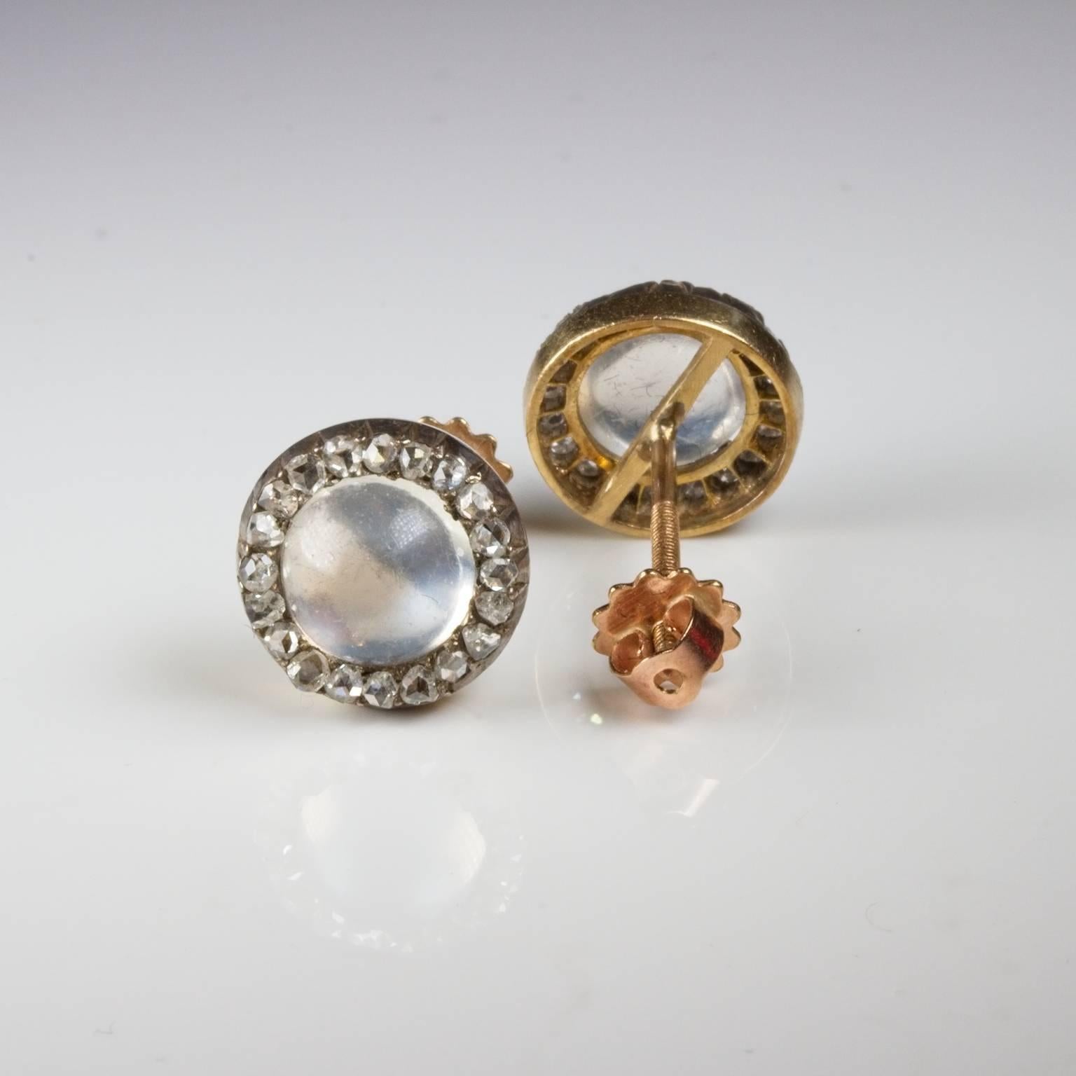 Pretty Victorian moonstone cluster stud earrings in 18ct gold each surrounded by 20 rose cut diamonds set in silver. 9ct gold screw posts and butterflies. Diameter approximately 7mm, depth 3mm - 3.5mm. This item is unique and once sold cannot be