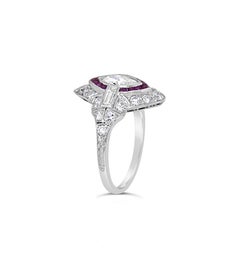 Platinum Art Deco Oval Diamond and French Cut Ruby Engagement Ring