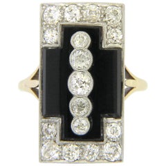 Antique Art Deco Onyx Diamond 1.32 Carat Gatsby Platinum Ring, circa 1920