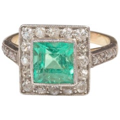 Art Deco Emerald Diamond Cluster Ring, circa 1920 Antique Art Deco Emerald Diamond Cluster Ring, circa 1920