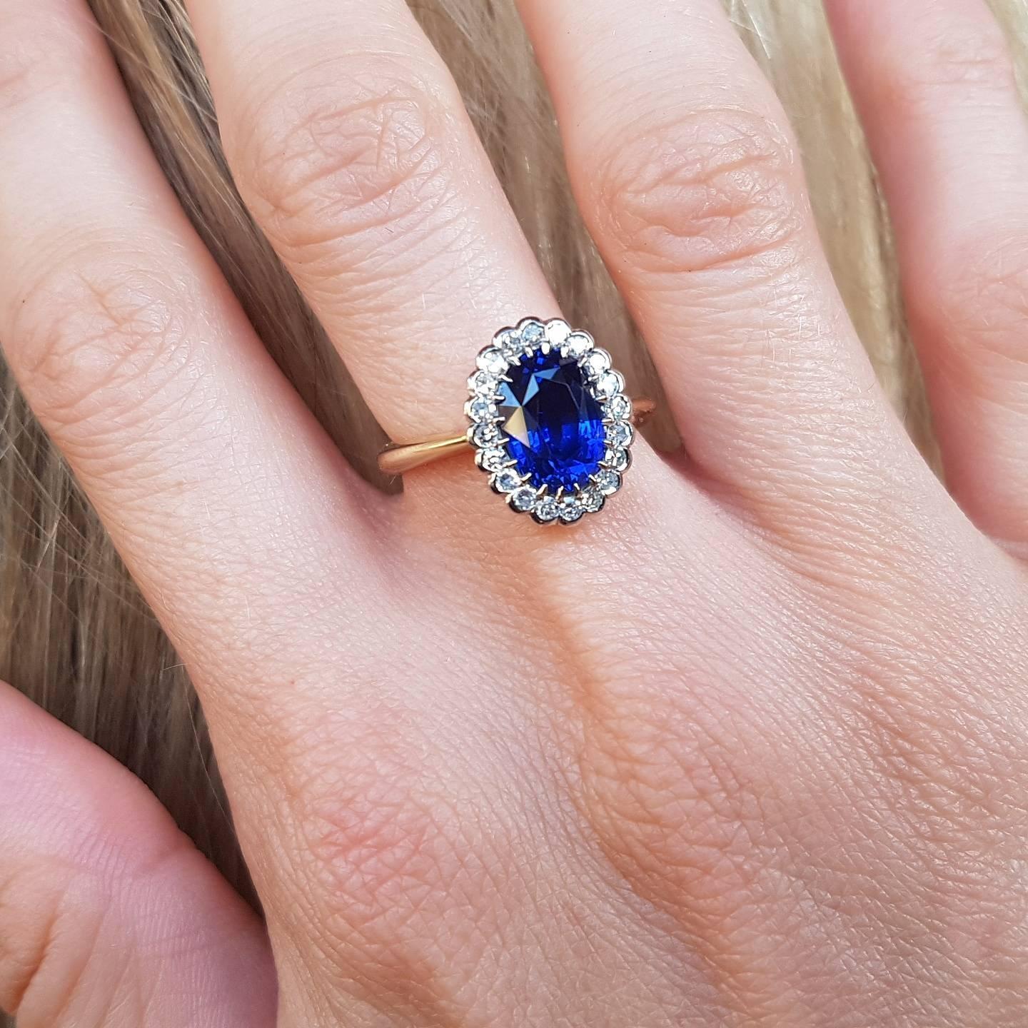 We chose this extraordinary oval faceted sapphire of known weight 2.78ct from a quantity of superior sapphires and our master jeweller set it with 20 single cut diamonds of total weight 0.30ct, colour F, clarity SI. Stunning colour! Currently size P