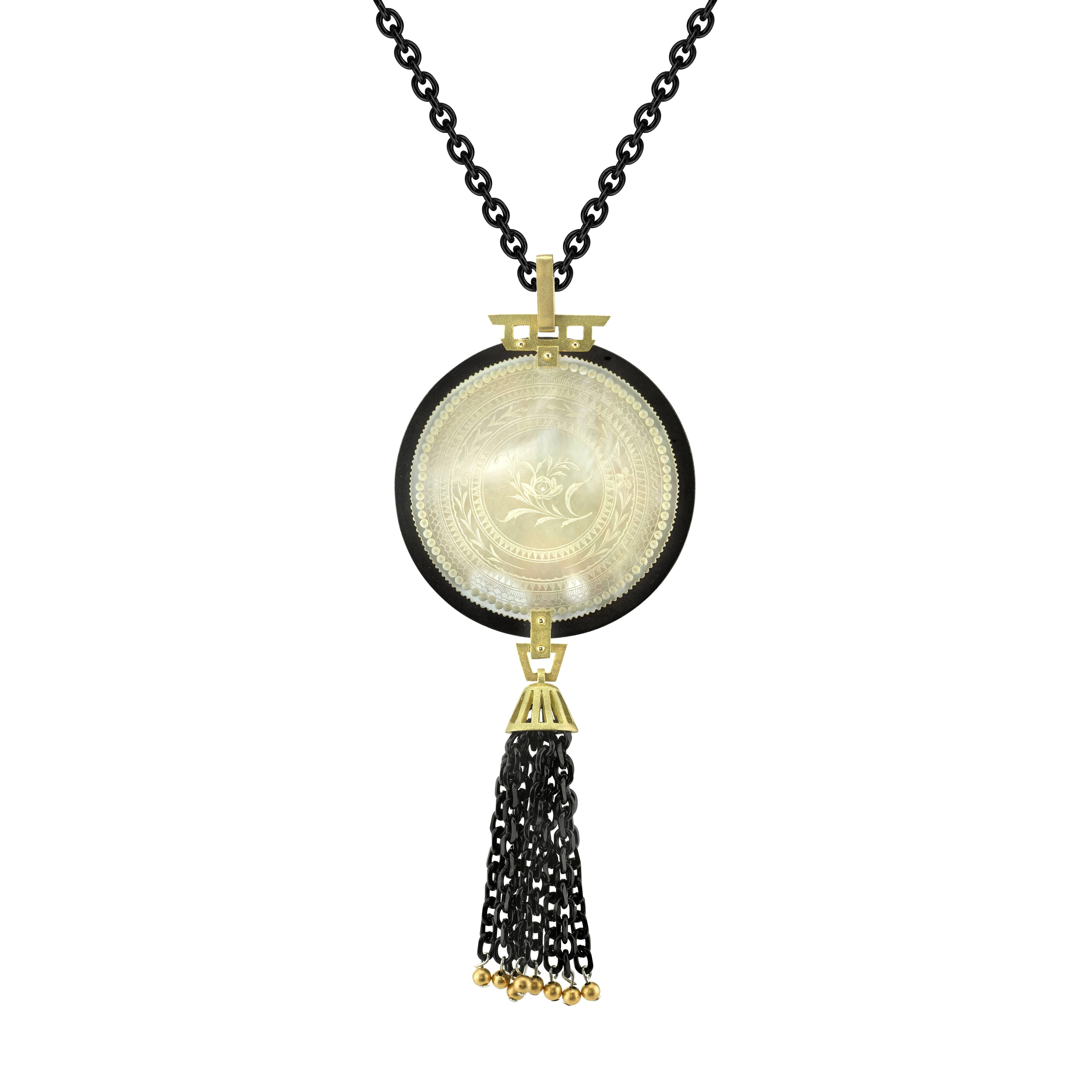 This pendant features an antique Chinese mother-of-pearl gambling counter with motifs dating back to the 18th Century. This is an original piece, with a finely engraved scene. Originally carved in China for export to Britain. The British used these