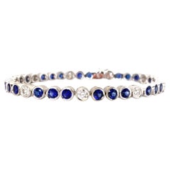 Blue Sapphire and Diamond Tennis Bracelet, White Gold Bezel, 6.42 Carats Total