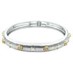 Bracciale Bangle con diamanti fiorentini in oro bianco e giallo