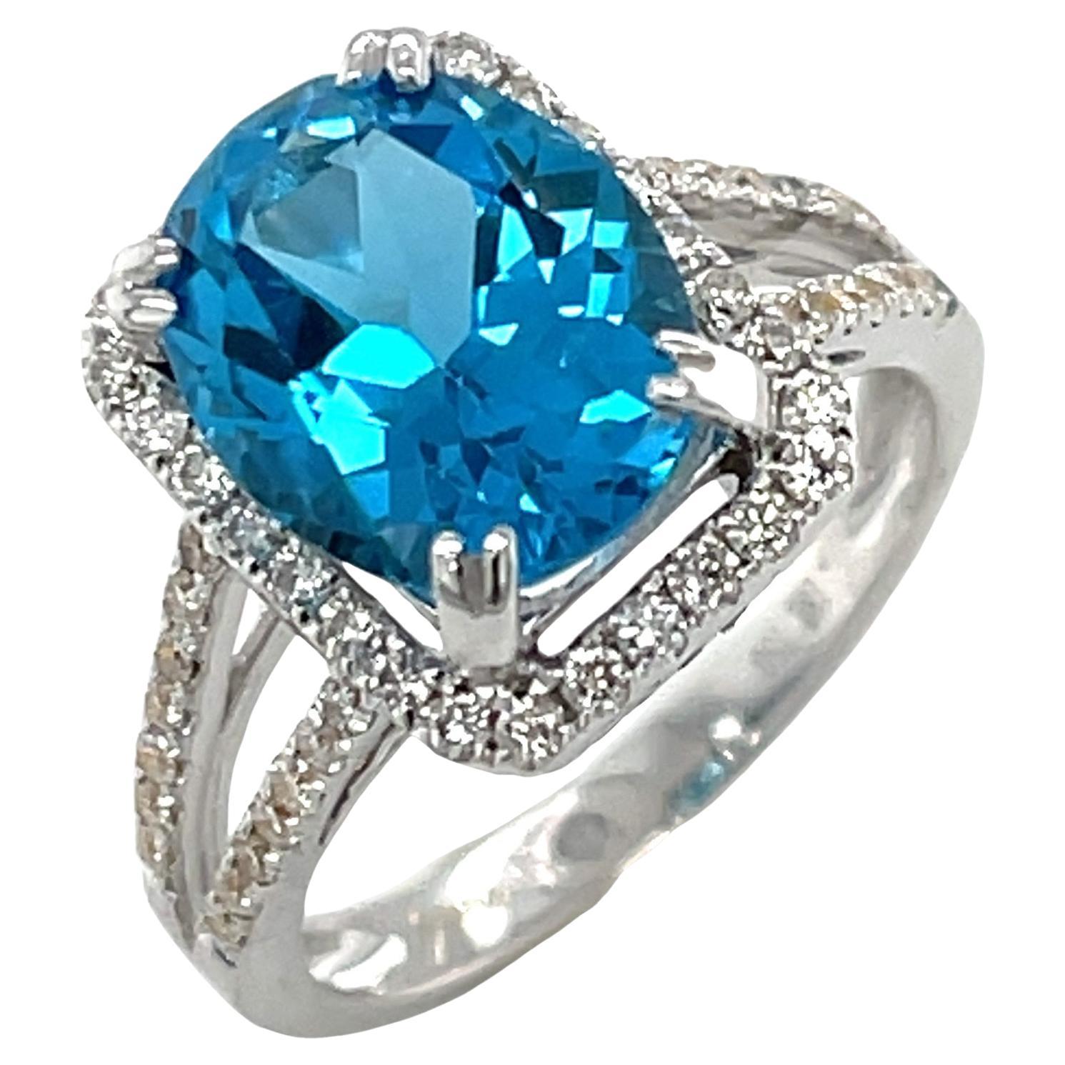 4.38 Carat Blue Topaz and Diamond Halo Cocktail Ring in 18k White Gold For Sale