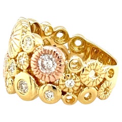 Anello a fascia con diamante "Fireworks" in oro rosa e giallo 18 carati
