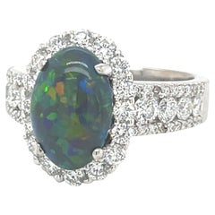 2.28 Carat Australian Black Opal, Diamond Halo Cocktail Ring in 18k White Gold