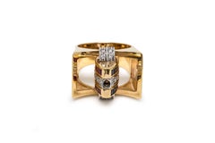 Diamond, Sapphire, Ruby and 18 Karat Gold Swivel Ring