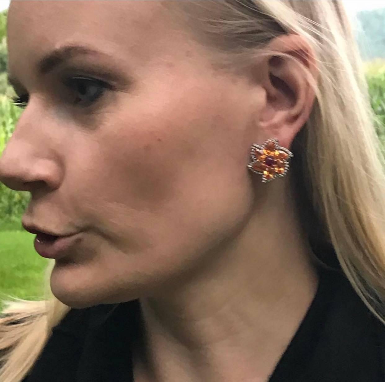 The Fabulous Specitite garnet Earrings with Red Spinel Cabochon Centers, Surrounded by Colorless Diamonds, Black Rhodium Plated, to Emphasize the Movement,  Classy Earrings can be worn for dressy or casual Occasion. Made in NYC,  18 K Gold,