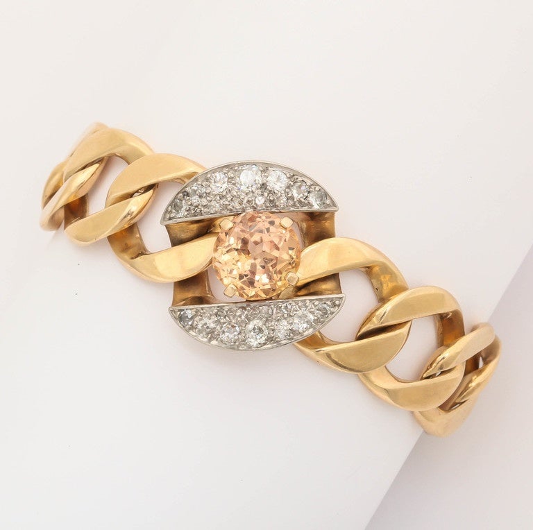 1930's gold link bracelet with a diamond link and citrine center