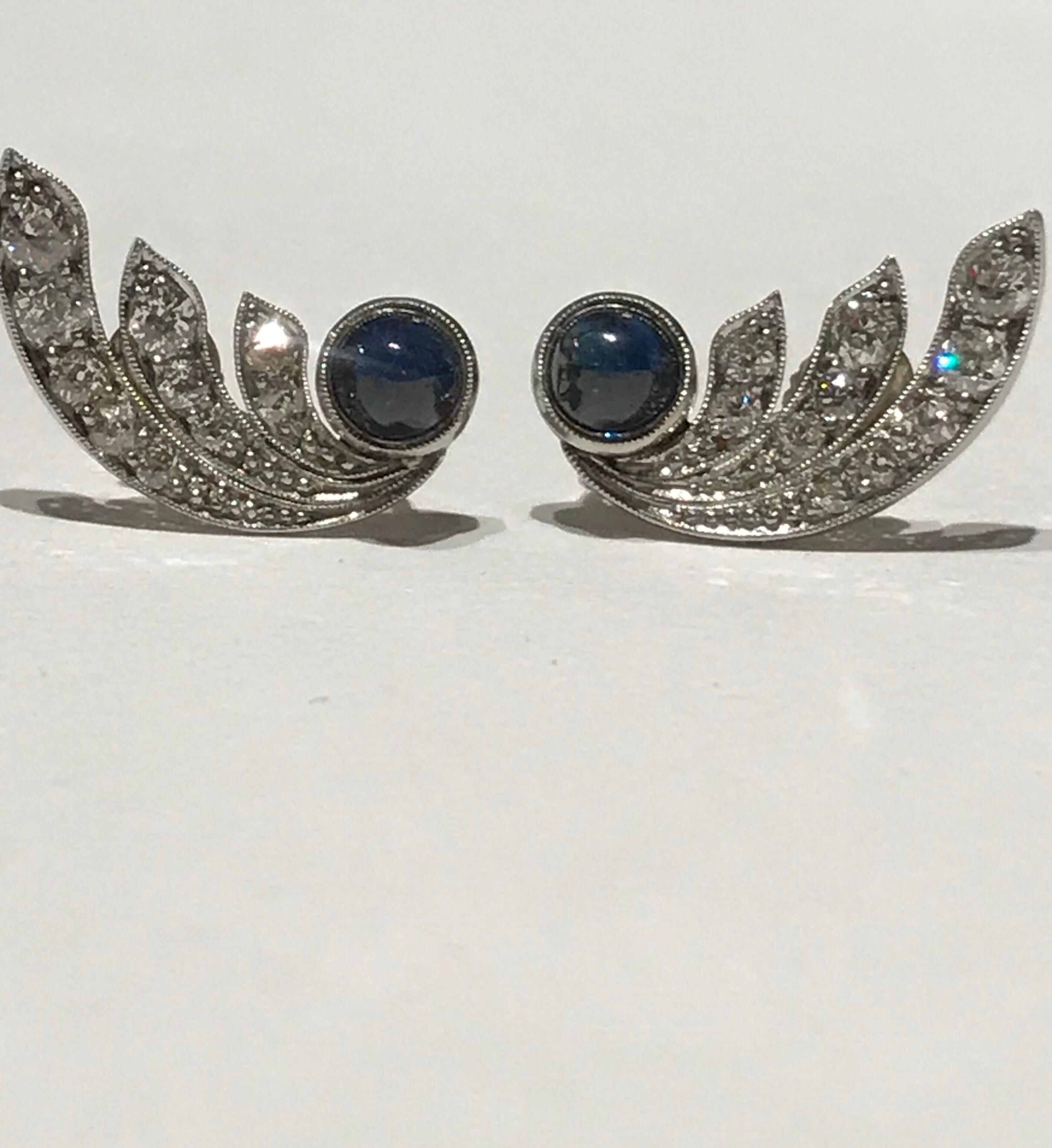 Art deco sugarloaf sapphire and diamond earrings set in 18 karat gold at the moment they have screw backs but I can have omega backs replace these ones in 18 karat gold to match if requested for no extra cost.  The diamonds are rose cuts and total