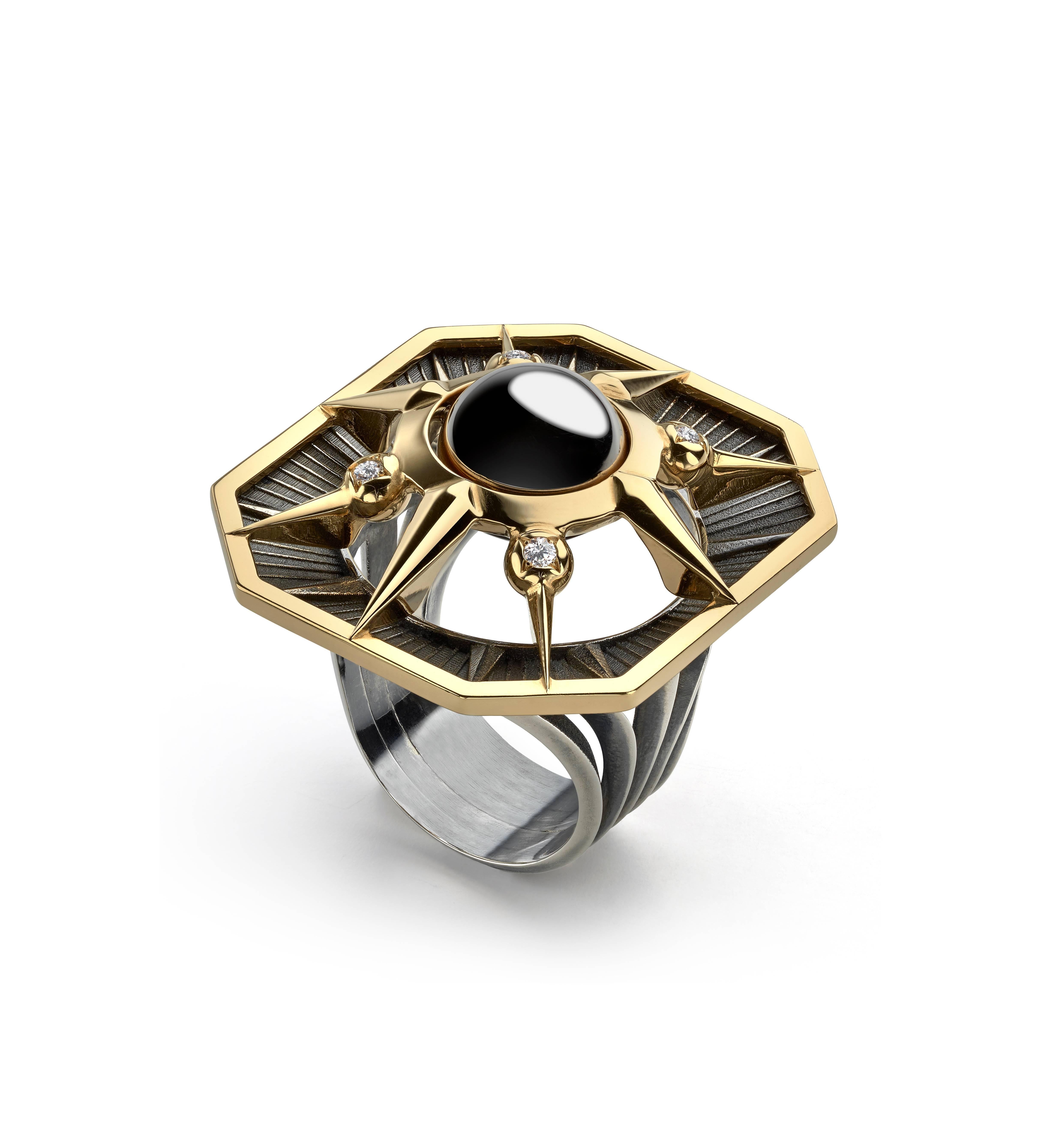 Ring GM Rectangle Yellow Gold Onyx Diamonds 

Rectangular ring comprising a patinated silver and yellow gold. An onyx disc at the centre of a yellow gold star, set in a pivoting half-sphere to be worn two different ways: all gold and silver or gold