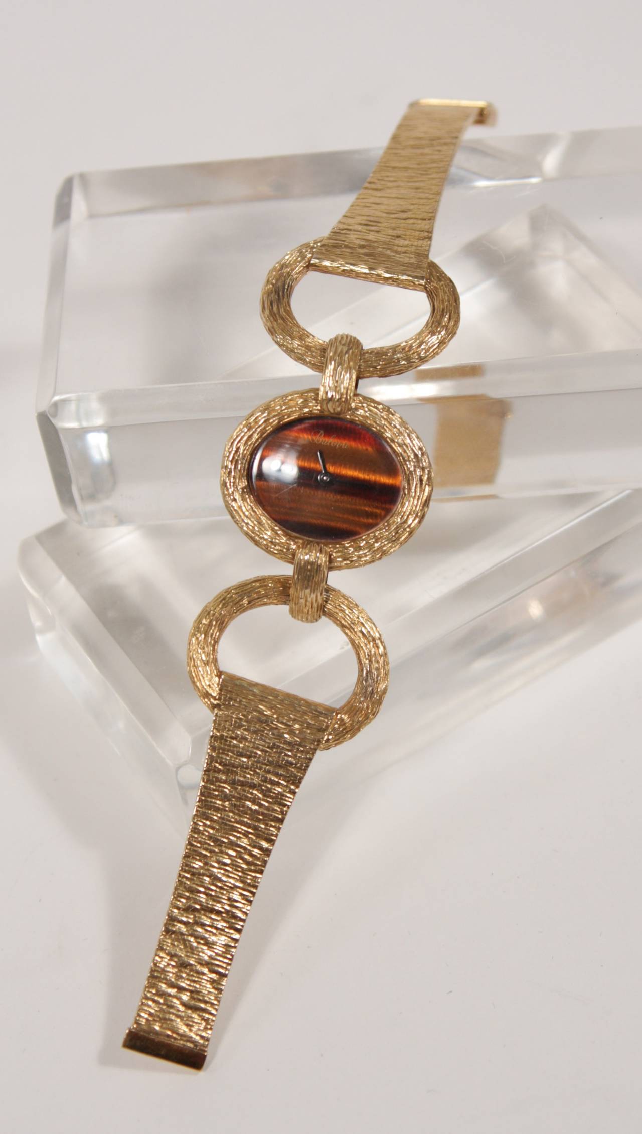 Bulova Lady's Yellow Gold Tiger's Eye Dial Bracelet Wristwatch at 1stdibs