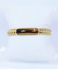 Bracciale in oro con diamante e rubino occhio di tigre