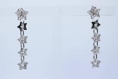 Pave Diamond Gold Dangle Star Earrings