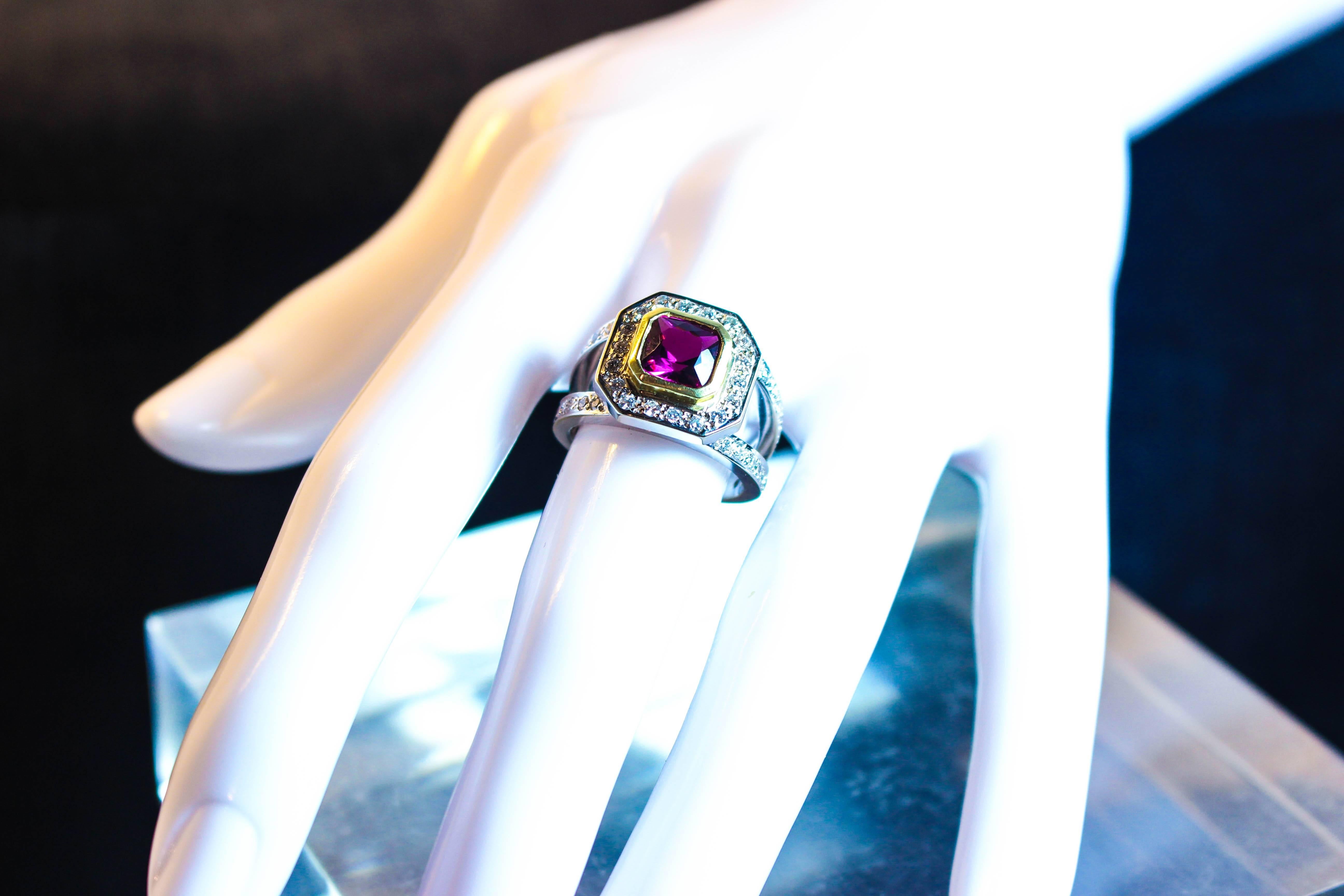 This beautiful ring features a stunning Rubelite center stone and is composed of 18kt white and yellow gold. There are pave diamonds throughout. Specs below. In excellent condition.

Please feel free to ask any questions you may have, we are happy