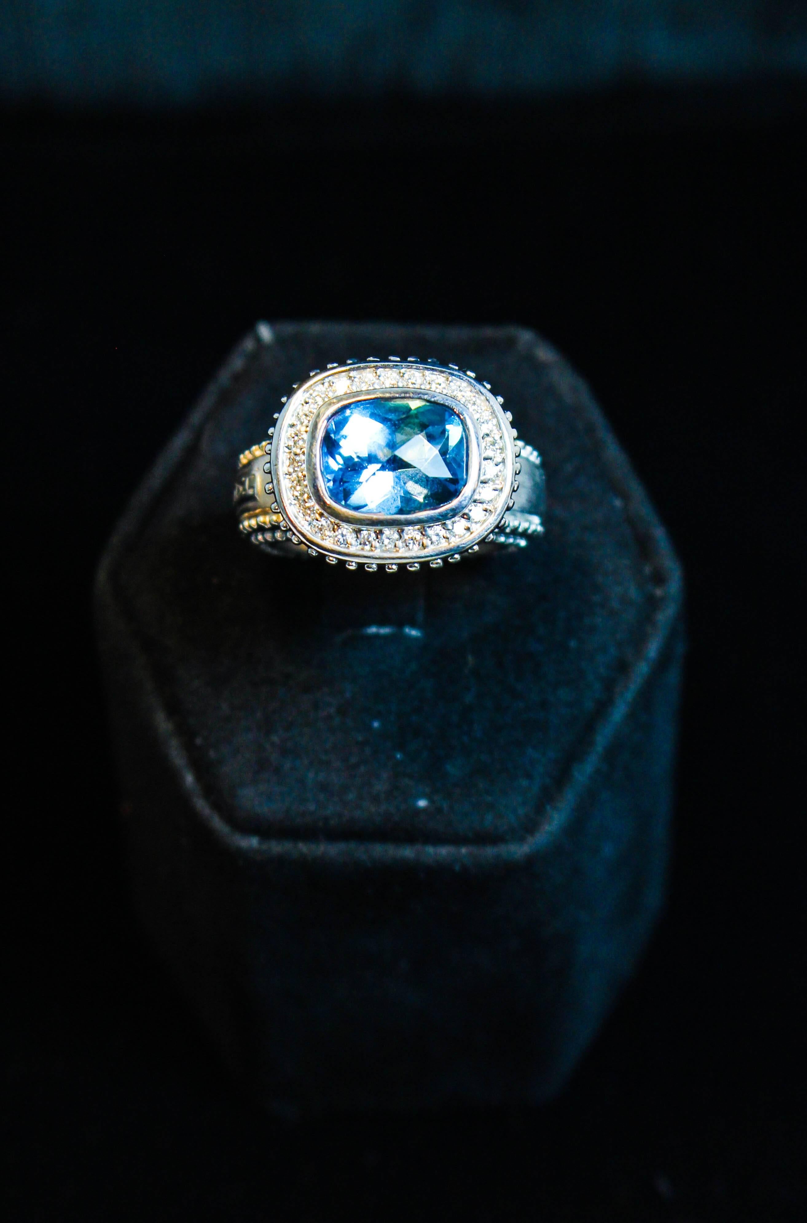 This beautiful ring features a stunning blue Topaz center stone and is composed of 18kt white gold. There are pave diamond accents. Specs below. In excellent condition.

Please feel free to ask any questions you may have, we are happy to assist.