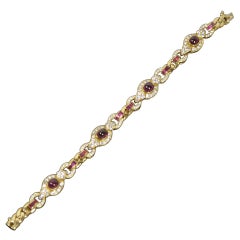 Cabochon and Calibre Cut Ruby Diamond Gold Bracelet
