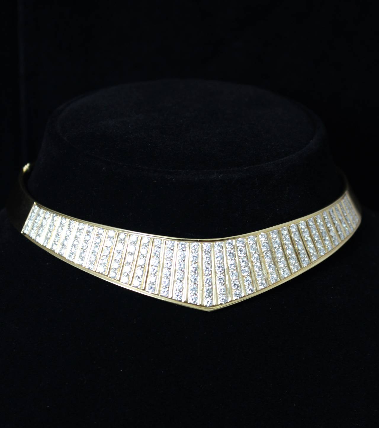 This is an exquisite 14k yellow gold diamond collar with a hinge opening.

It was a gift from Cary Grant to Terry Moore. “Cary Grant gifted me with this beautiful diamond collar for letting him cry on my shoulder while he was going through a