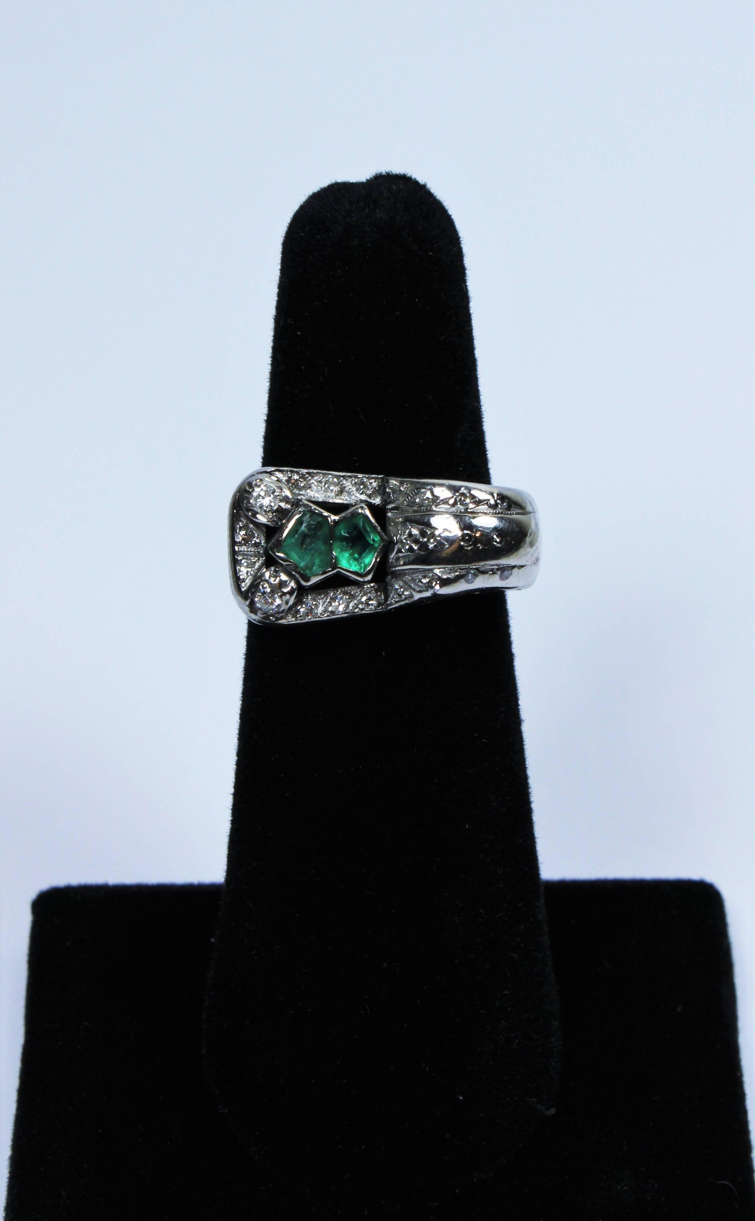 This vintage ring is available for viewing at The Paper Bag Princess of Beverly Hills Boutique. We offer a large selection of fine luxury items.

 This ring is composed of 14KT gold featuring emeralds and is accented with diamonds. 

Please feel