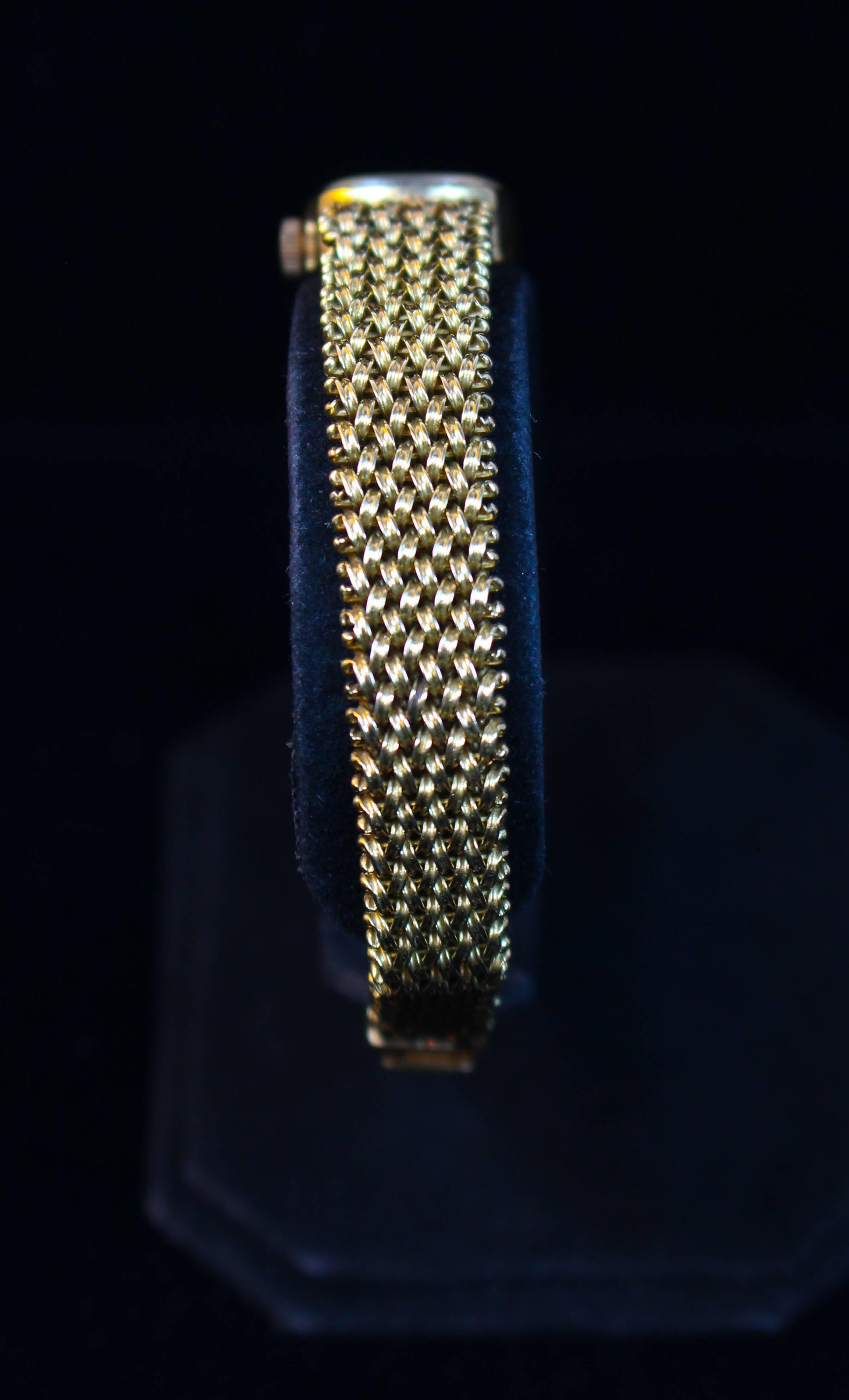 Omega Lady's Yellow Gold Woven Wristwatch In Excellent Condition For Sale In Los Angeles, CA