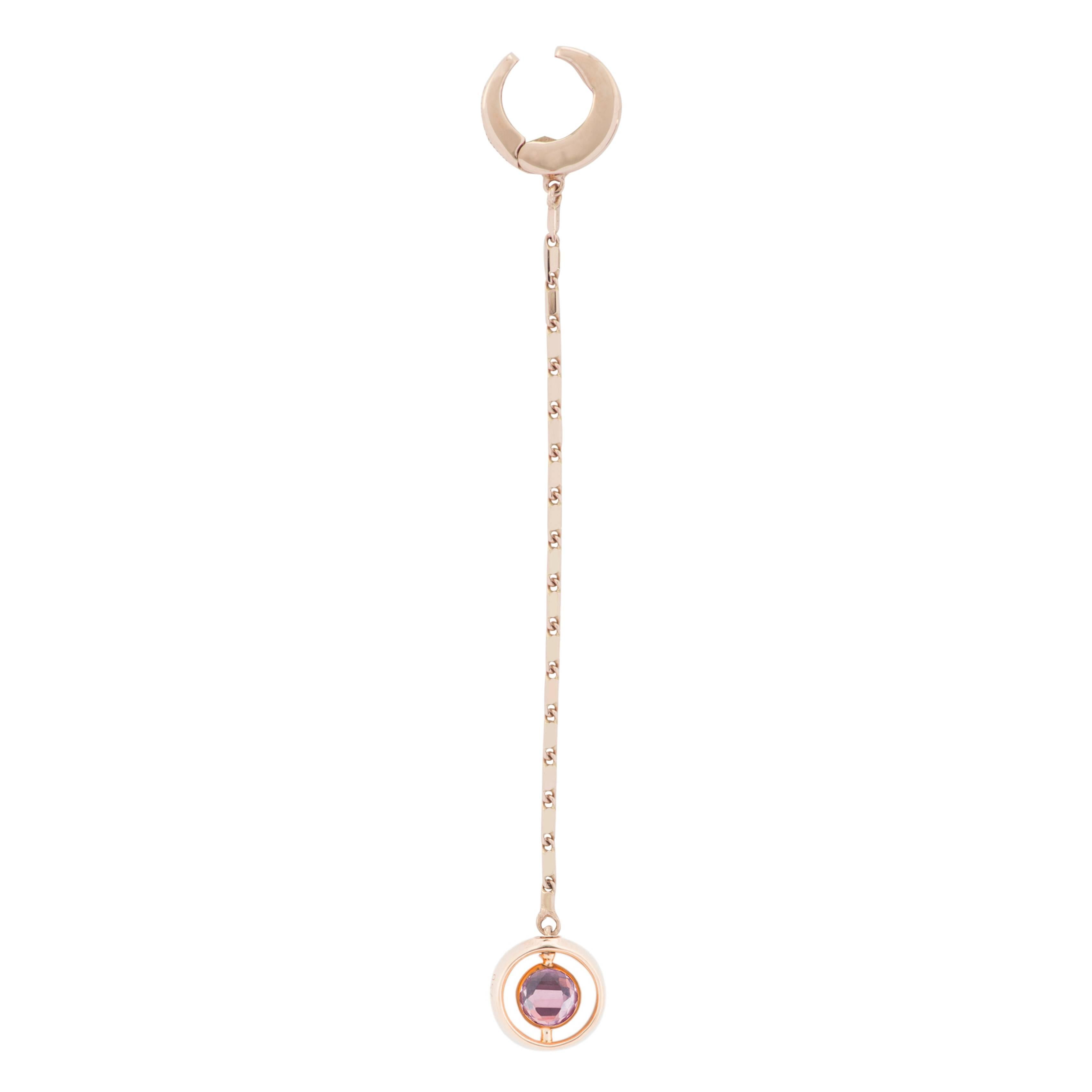 This Single Long Clip Earring is designed by the French Jewelry brand Marie Mas. It is in 18 Carat Pink Gold, with Diamonds, Pink Amethyst and London Blue Topaz. The center stone is reversible : there is a Pink Amethyst and a London Blue Topaz back