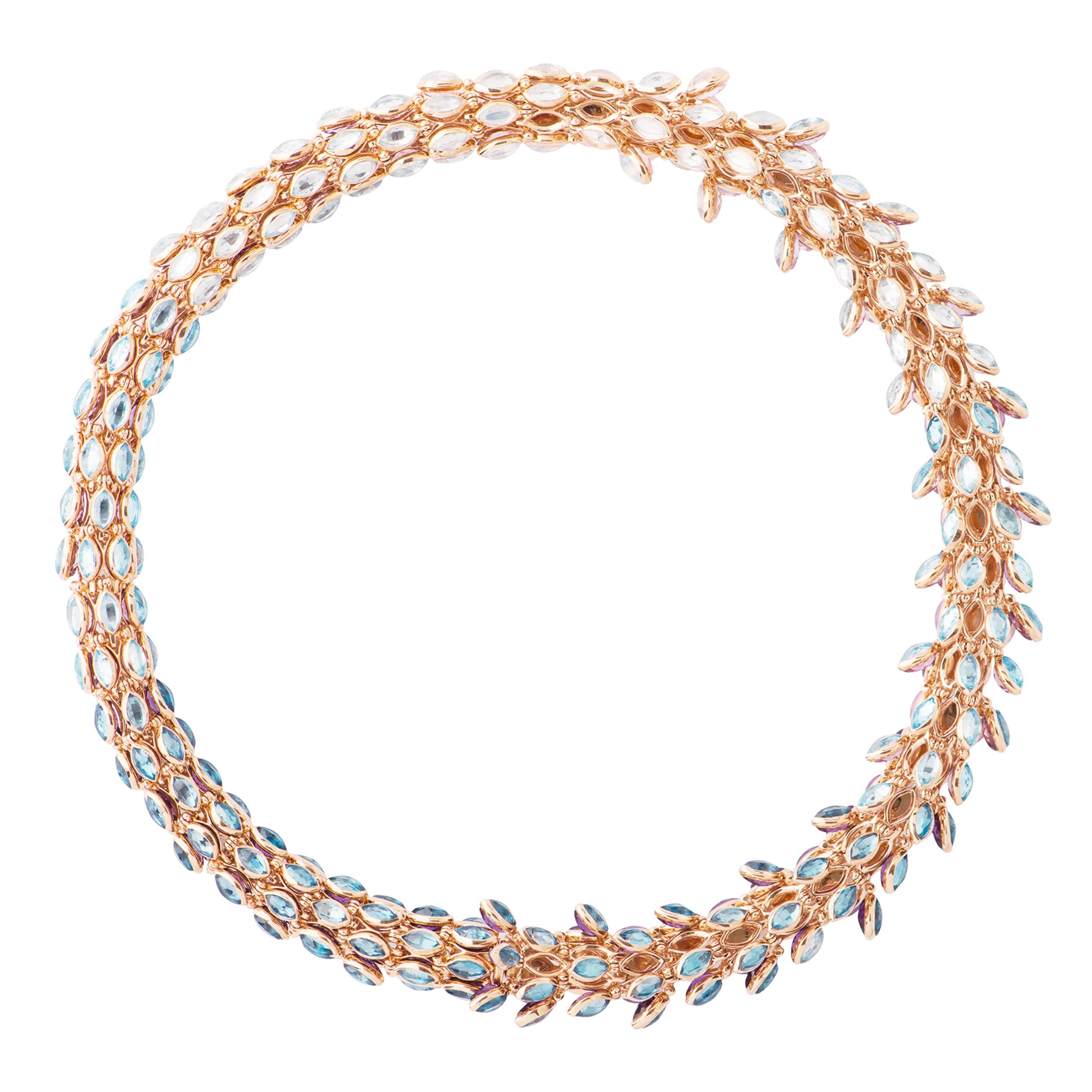 This Necklace is a High Jewelry piece from Marie Mas' Swinging Stones collection. 
This piece, stuns with innovative mechanisms and vibrant contrasting gemstones. The necklace is entirely articulated. Every articulated element has two stones set