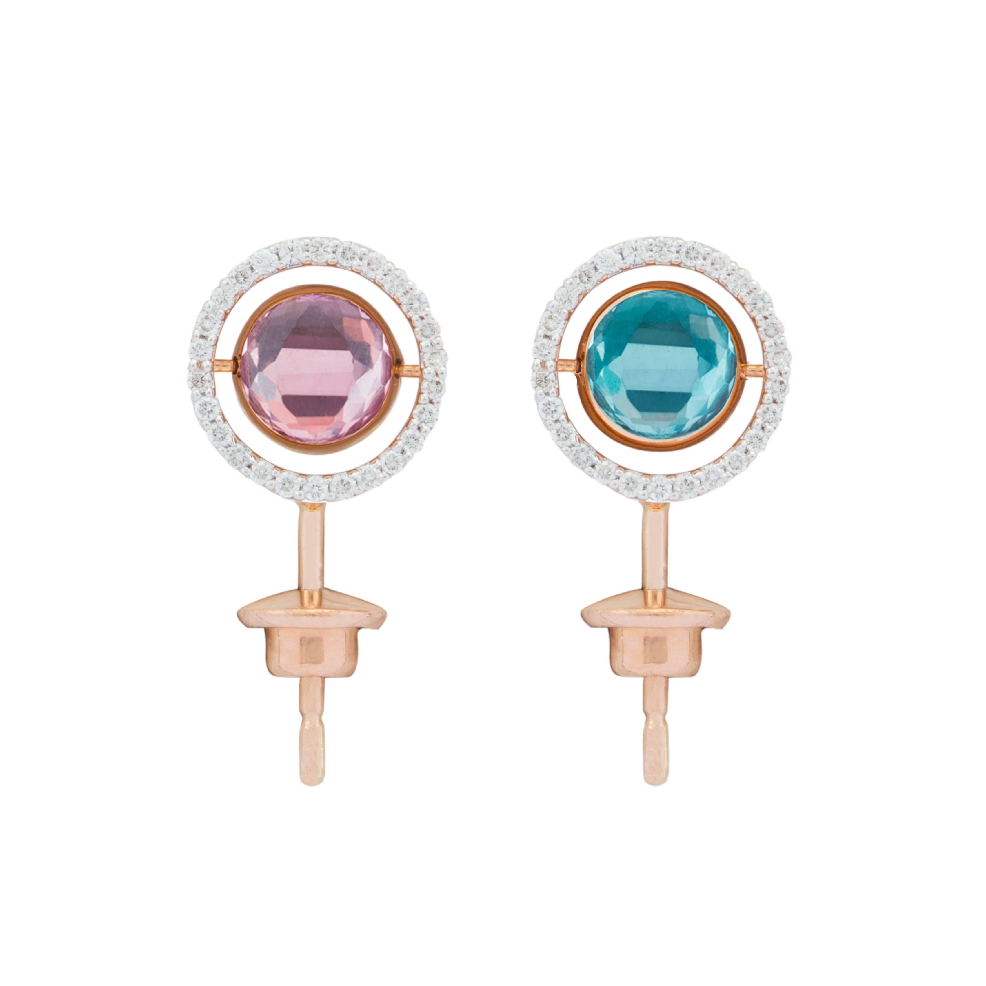 This pair of Earrings, from the French Jewelry brand Marie Mas, are made in 18 Karat Rose Gold. 
On each earring, the round element is reversible : there is a Pink Amethyst and a London Blue Topaz back to back that you can rotate to choose the side