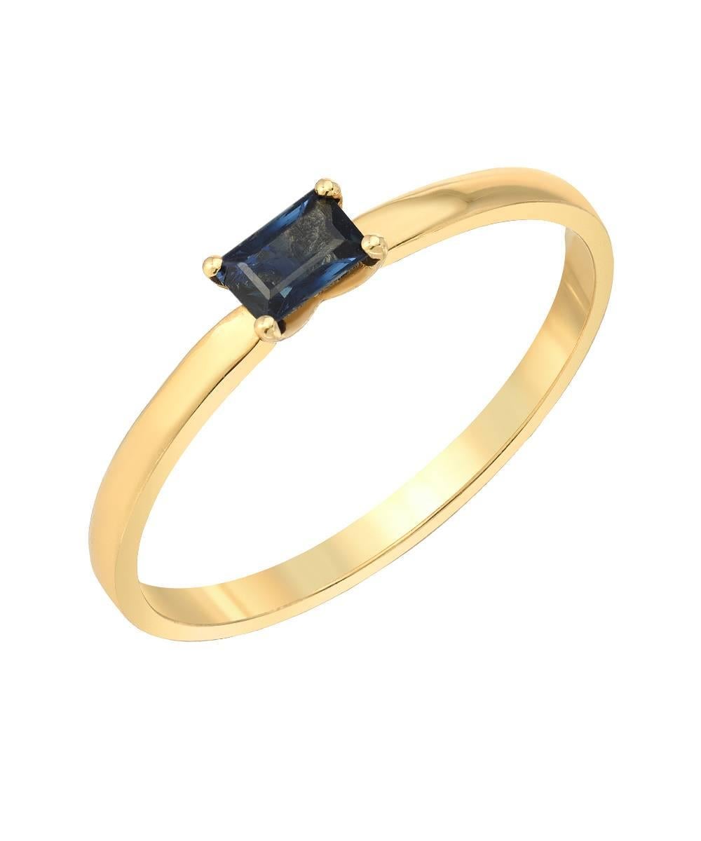 18 karat yellow gold stacking band with prong set baguette shape sapphire. Great to stack with other rings.

Designed and made in Los Angeles. 

Please contact us with any questions.

Available in all US sizes and color stones. 
