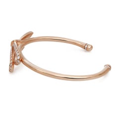 Tiffiany & Co. Bracciale a cuff con grande fiocco di diamanti, oro rosa 18 carati, misura media