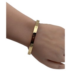 Bracciale Cartier Love, modello classico, oro giallo 18 carati, misura 21