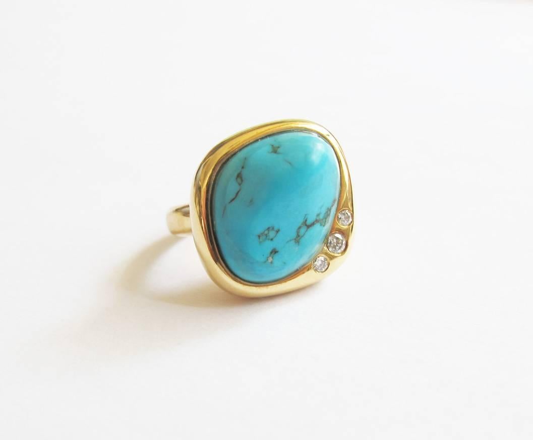 This 18K yellow gold ring from Candice Luk Fine Jewellery features a beautiful sculptural turquoise 'dome' with three white diamond accents.  A statement ring that is subtle enough for everyday wear. 

Ring size: US 5.5
Diamond weight: 0.14ct