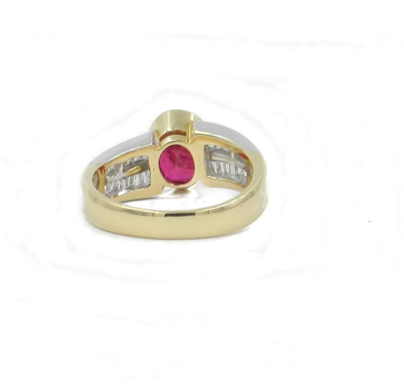 Modern Oval Shape Ruby 1.93 and Baguette Cut Diamonds 0.82 Ring, circa 1960 For Sale