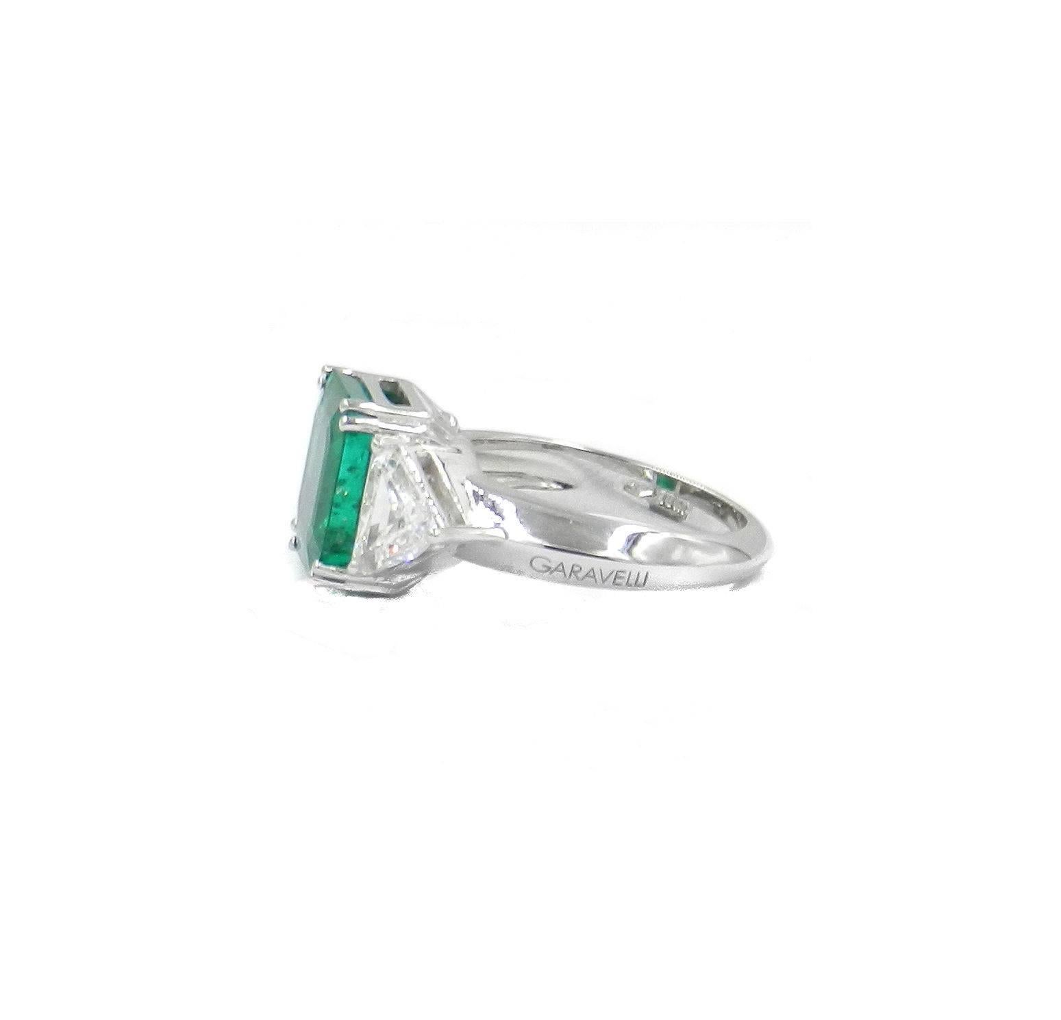 Contemporary Gubelin Certified Colombian Emerald Ct 5.48 Two Triangular Diamonds Ct 1.65 Ring For Sale